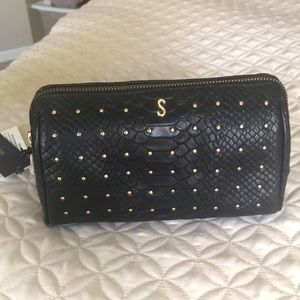 NWT Rebecca Minkoff clutch/cosmetic bag in black embossed leather.